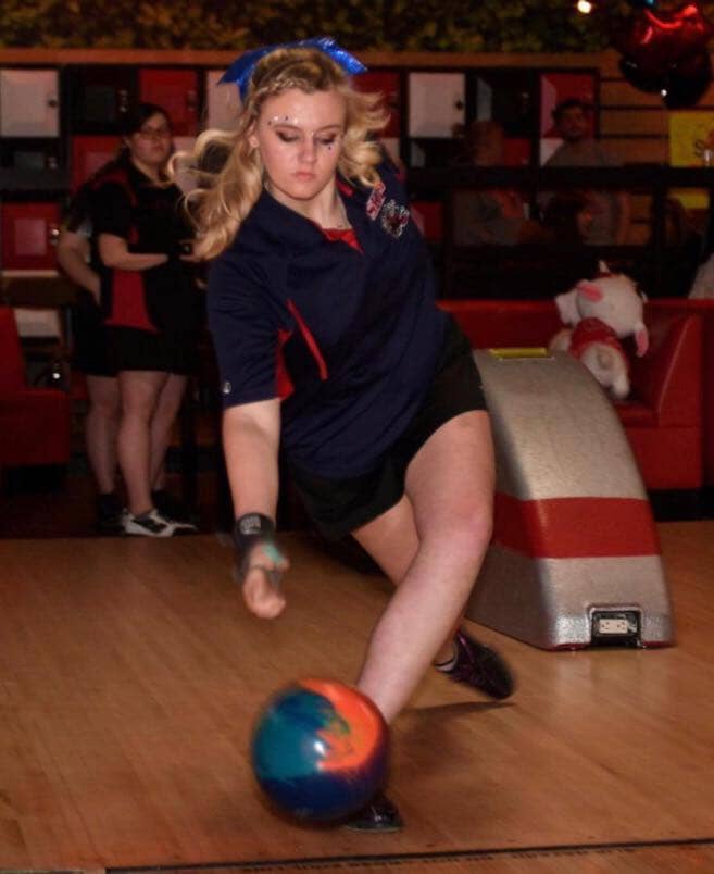 photo of girl bowling